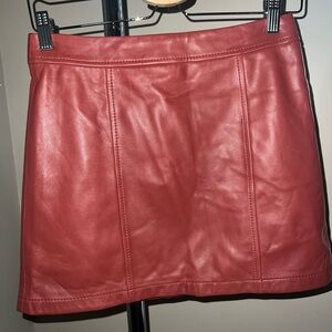 Faux leather skirts in navy and red!